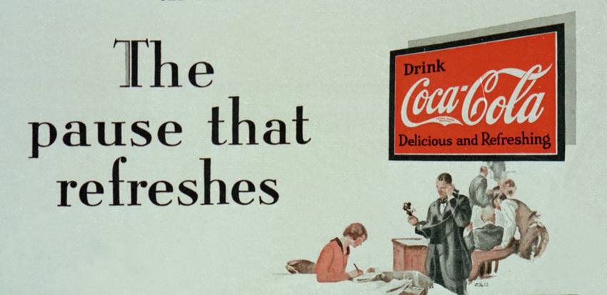 Pausing from a Coca-Cola ad
